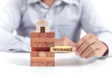 6 Ways to Lower Your Home Insurance Premiums by $600 Annually